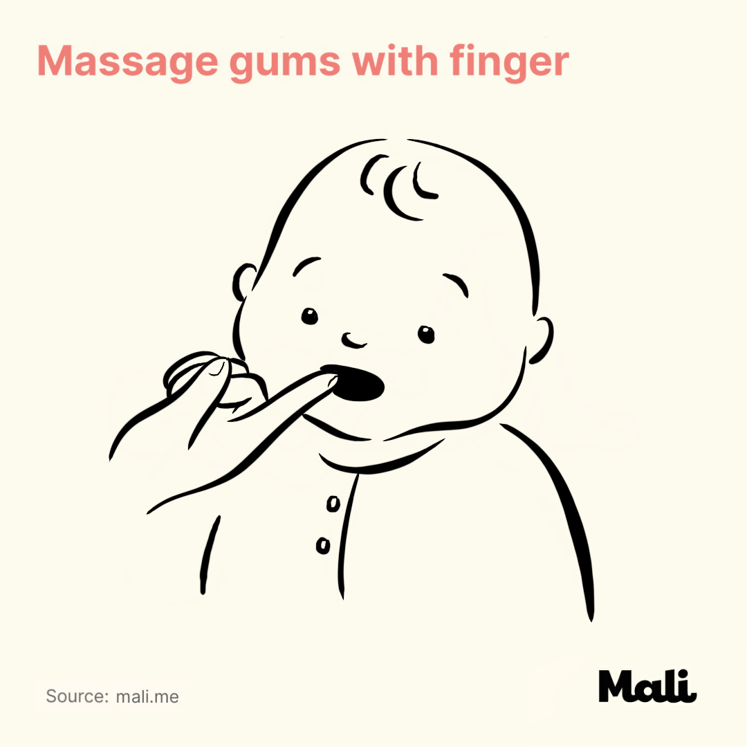 Massage gums with finger_5 ways to relieve teething-related pains by Mali