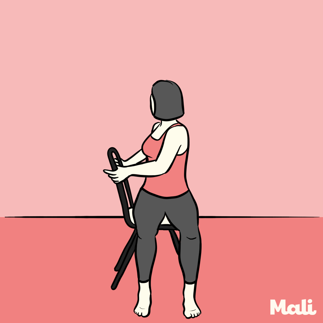 Minute yoga simple chair pose to fight back pain